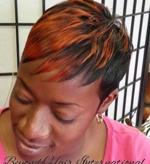 African American short edgy hairstyle with highlights
