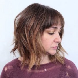 messy layered bob with ombre highlights